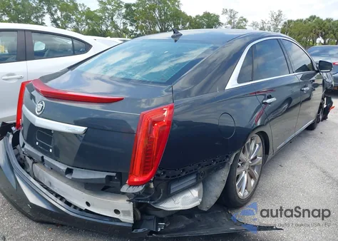 2014 Cadillac Xts Luxury from USA, damaged, VIN 2G61M5S39E9221111